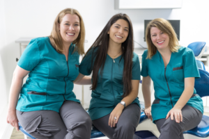 a group of dental assistants smiling