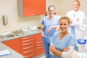 a dental assistant talking with a patient